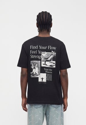 Puma, GRAPHICS POSTER RELAXED TEE - T-shirt print - black