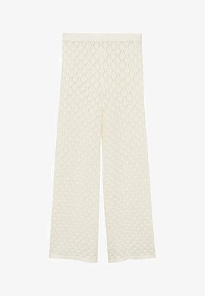 Pantaloni a gamba larga di colore crema con tessuto strutturato a motivo diamante. Presentano una vita liscia e una vestibilità morbida e ariosa.