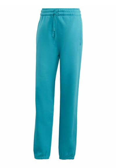 Turkisblå fleece joggingbukser med elastisk talje, justerbar snøre, sidelommer og elastiske manchetter ved anklerne.