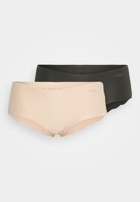 Twee paar naadloze onderbroeken: één lichtbeige en één zwart, beide met een gladde textuur en golvende randen. Merkl logo zichtbaar.