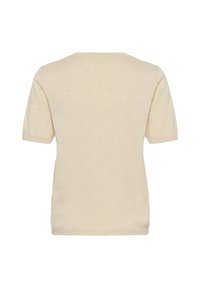 Lühikeste varrukatega, kreemikas kudumtop tekstuurse mustriga, millel on reljeefsed täpid, ümar kaelus ja pehme, kerge kangas.