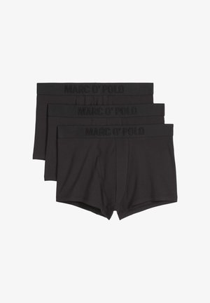 Boxer in cotone nero in confezione da tre. Presentano un cinturino elastico con la scritta "MARC O'POLO" in rilievo. Texture liscia, design aderente.