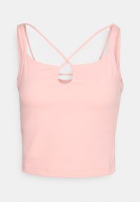 Top curto rosa com alças finas, design das costas cruzadas e um recorte circular na frente. Feito de um tecido macio e elástico.
