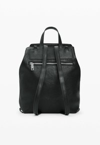 Black leather backpack with a textured finish, featuring two adjustable straps, a top handle, and a front zip pocket.