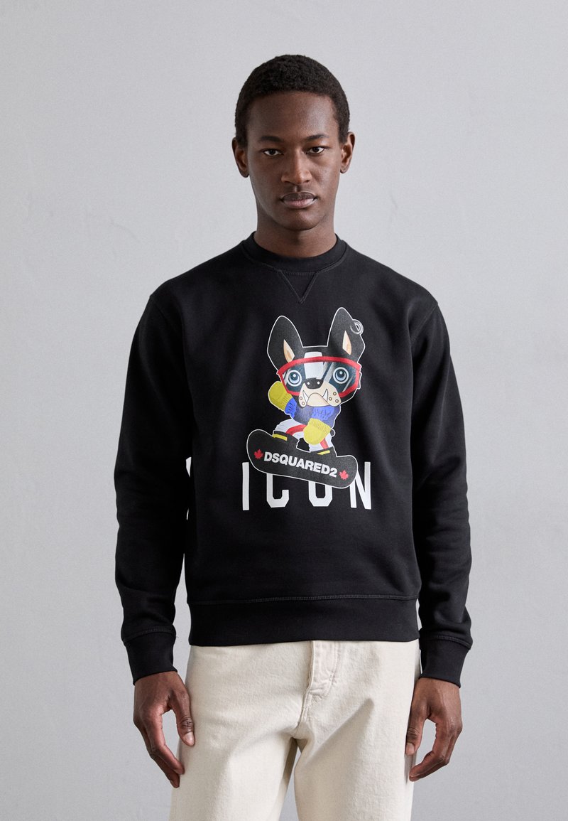 Black sweatshirt featuring a colorful graphic of a cartoon dog in sports gear, with "ICON" and "DSQUARED2" text in white.