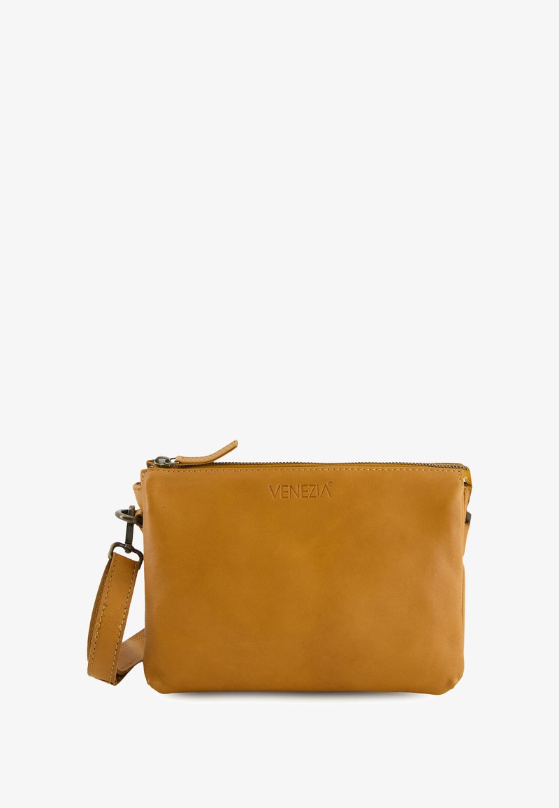 Tan leather wristlet clutch with zipper closure and embossed "VENEZIA" logo on front, featuring a detachable strap on a white background.
