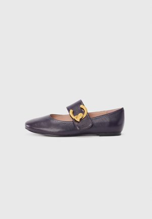 Purple leather ballet flat with a pointed toe and flat sole. Features a gold buckle accent on a secure strap across the instep.