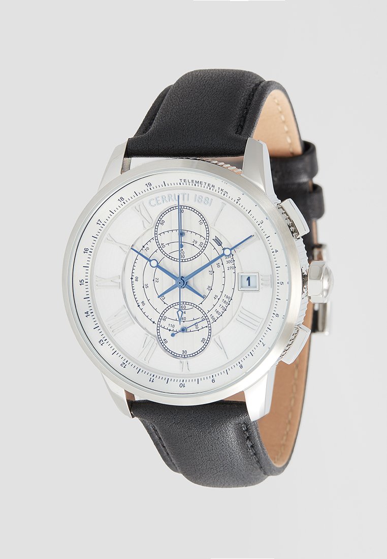 Montre argentée avec un cadran blanc, aiguilles et repères bleus, trois sous-cadrans et un bracelet en cuir noir. Design de boîtier circulaire avec une fenêtre de date.