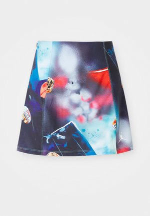 Short, multicolored sports skirt featuring a vibrant splatter design with accents and logos. Made of lightweight, breathable fabric.