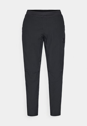 Pantaloni neri con cintura elastica, design slim fit, materiale leggero e tasca laterale con dettaglio logo circolare.