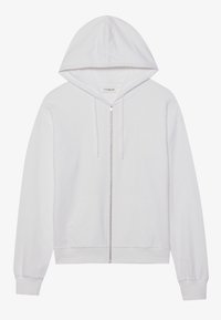 Sweat à capuche blanc avec fermeture éclair, fabriqué en tissu doux. Comprend une poche avant, une capuche à cordon de serrage et des poignets côtelés. Design classique et simple.