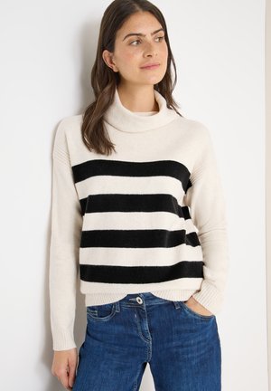 - Sweter