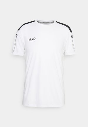 Weißes T-Shirt mit schwarzen Schulterakzenten, "JAKO"-Logo auf der Brust und grauen kreisförmigen Details an den Ärmeln. Kurze Ärmel und Rundhalsausschnitt.