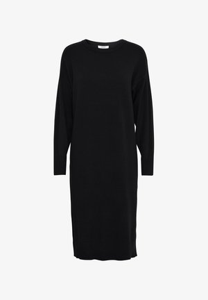 Vestido de punto negro con mangas largas, escote redondo, puños y dobladillo acanalados. Silueta recta con un corte a media longitud. Textura suave.