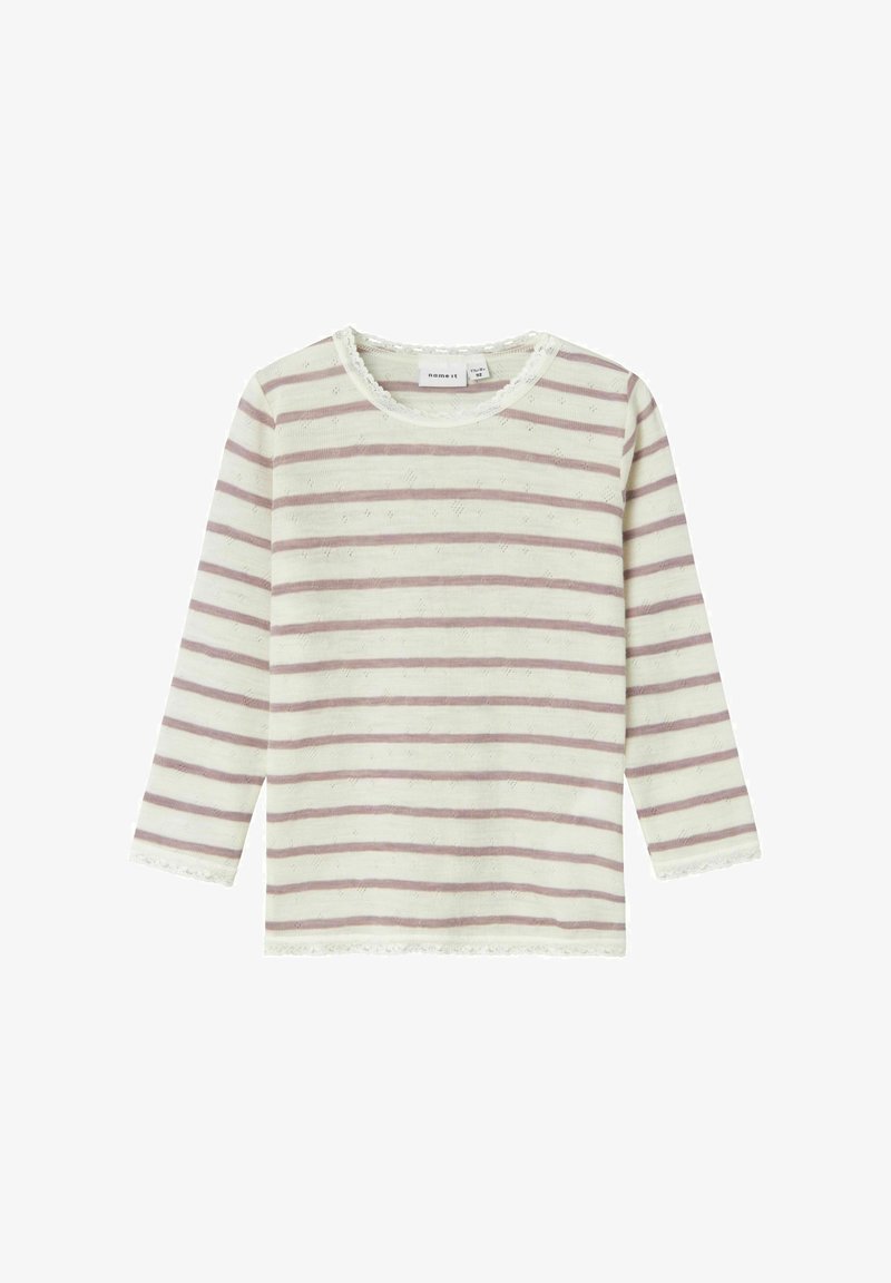 Šviesiai grietinėlės spalvos ilgomis rankovėmis marškiniai su rožinėmis horizontaliomis juostelėmis. Apvalus kaklas ir tekstūruota medžiaga, su nėrinių apdaila ant kaklo ir rankovių.