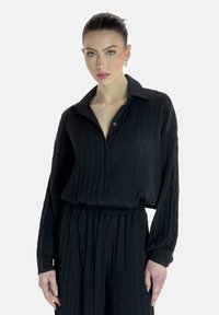 Elara LANGESSET - Pantalon classique - schwarz