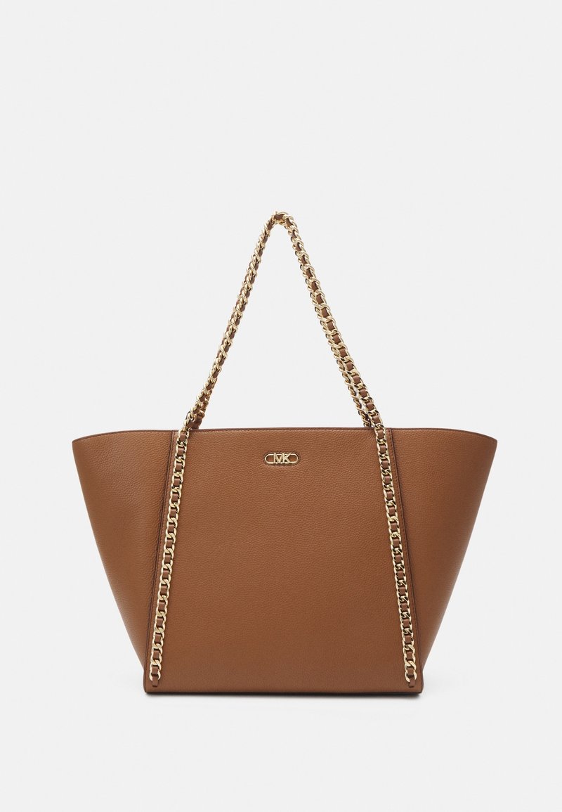 Brown faux leather tote bag with a triangular shape, featuring a gold chain strap and a small logo on the front. Smooth texture.