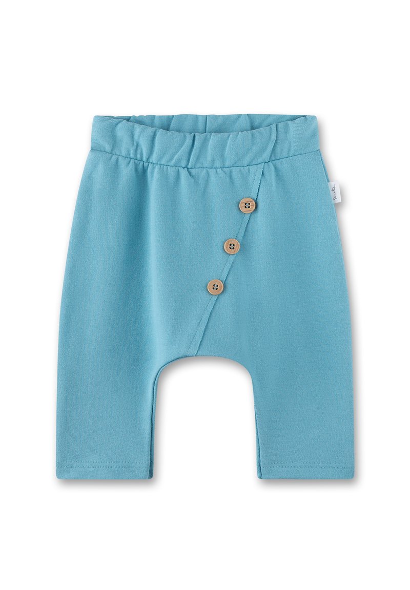Light blue cotton shorts with an elastic waistband, featuring a diagonal button closure with three wooden buttons on the front.