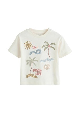 White short-sleeve t-shirt with colorful embroidered sun, waves, two palm trees, seashell, and "Beach Life" and "Le Soleil" text.