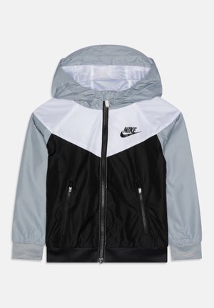 KEY ITEM CHEVRON WINDRUNNER UNISEX - Kurtka przejściowa - black/white