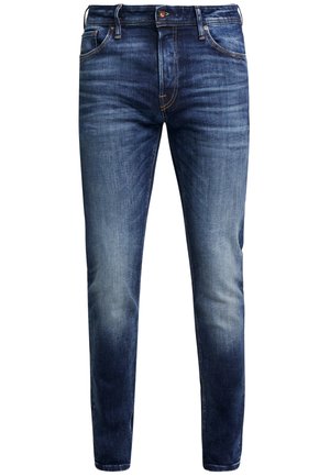 Denim jeans in dark blue with a faded finish, slim fit design, five pockets, and metal button closure. Stitching in a contrasting color.