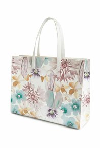 Borsa a mano bianca con motivo a fiori che presenta disegni floreali dai colori pastello in rosa, blu e giallo con manici robusti bianchi.