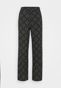 Svarta byxor med vita geometriska mönster av diamanter och fyrkanter, rak benstil och hög midja.