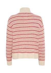 Stickad tröja med hög krage, krämfärgad bas och röd geometrisk mönstring. Ribbad mudd och midjeband, något kortad passform bak.