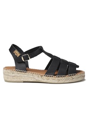 Zwarte leren espadrille sandalen met een gewoven jute tussenzool, meerdere bandjes, verstelbare gesp, platte zool en subtiele stikdetails.