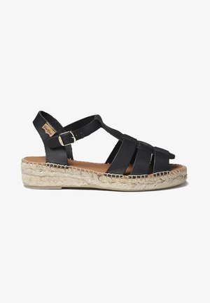 Czarne skórzane sandały espadryle z plecioną podeszwą ze sznurka juty, wielopaskowym designem, regulowaną klamrą, płaską podeszwą i delikatnym przeszyciem.