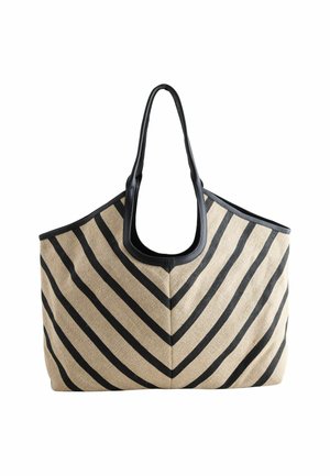 Large tote bag with a chevron pattern in beige and black, featuring a rounded top and two sturdy black handles.