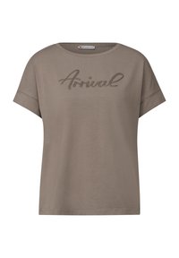 Short-sleeved, taupe t-shirt made from cotton, featuring a cursive "Arrival" design adorned with rhinestones. Rounded neckline and relaxed fit.