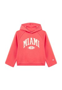 Koralowa bluza z kapturem z białym napisem "MIAMI 502". Posiada długie rękawy raglanowe, przednią kieszeń typu kangaroo oraz miękki, teksturowany materiał.