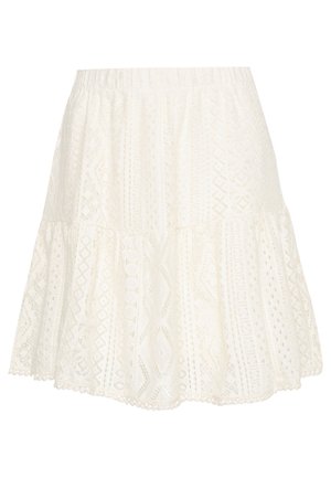 Hvid nederdel i bomuld med blonder, elastik i taljen og udvidet, lagdelt kant med geometriske og blomstrede mønstre.