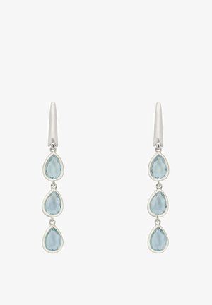 Silberohrringe mit drei tropfenförmigen, hellblauen Edelsteinen. Glatte Oberfläche mit polierter Finish. Geeignet für formelle oder legere Anlässe.