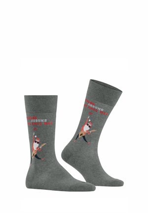Gray cotton socks featuring a festive graphic of a singing character with a guitar and text "ROCKING AROUND THE XMAS TREE" in red.