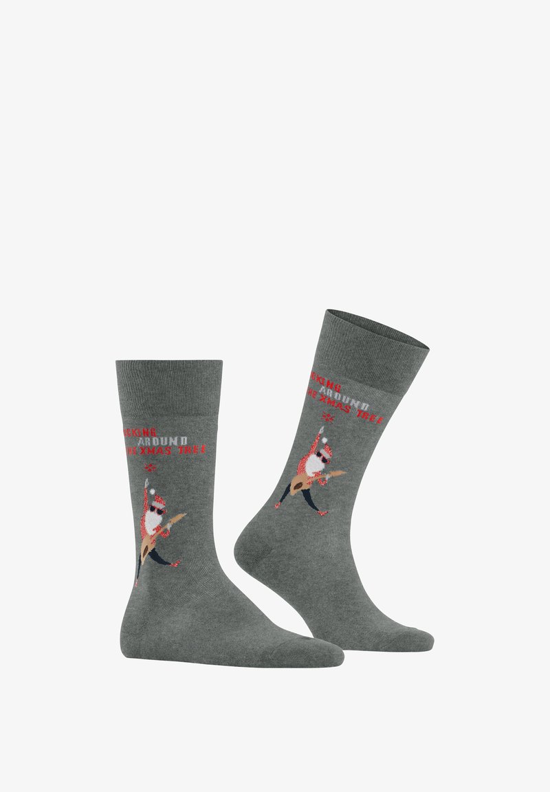 Chaussettes en coton grises avec un motif festif d'un personnage chantant avec une guitare et le texte "JOUER AUTOUR DU SAPIN DE NOËL" en rouge.