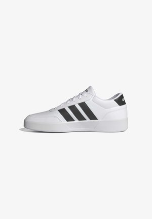 White athletic shoe with a smooth leather upper, three black stripes on the side, and a sturdy white rubber sole.