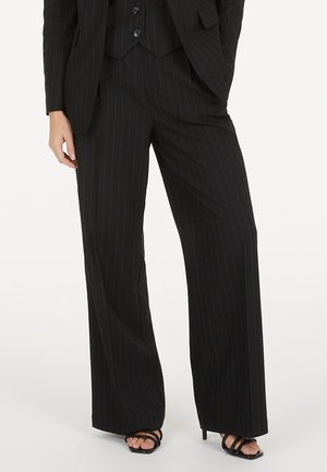 BUNDFALTEN - Stoffhose - black varied