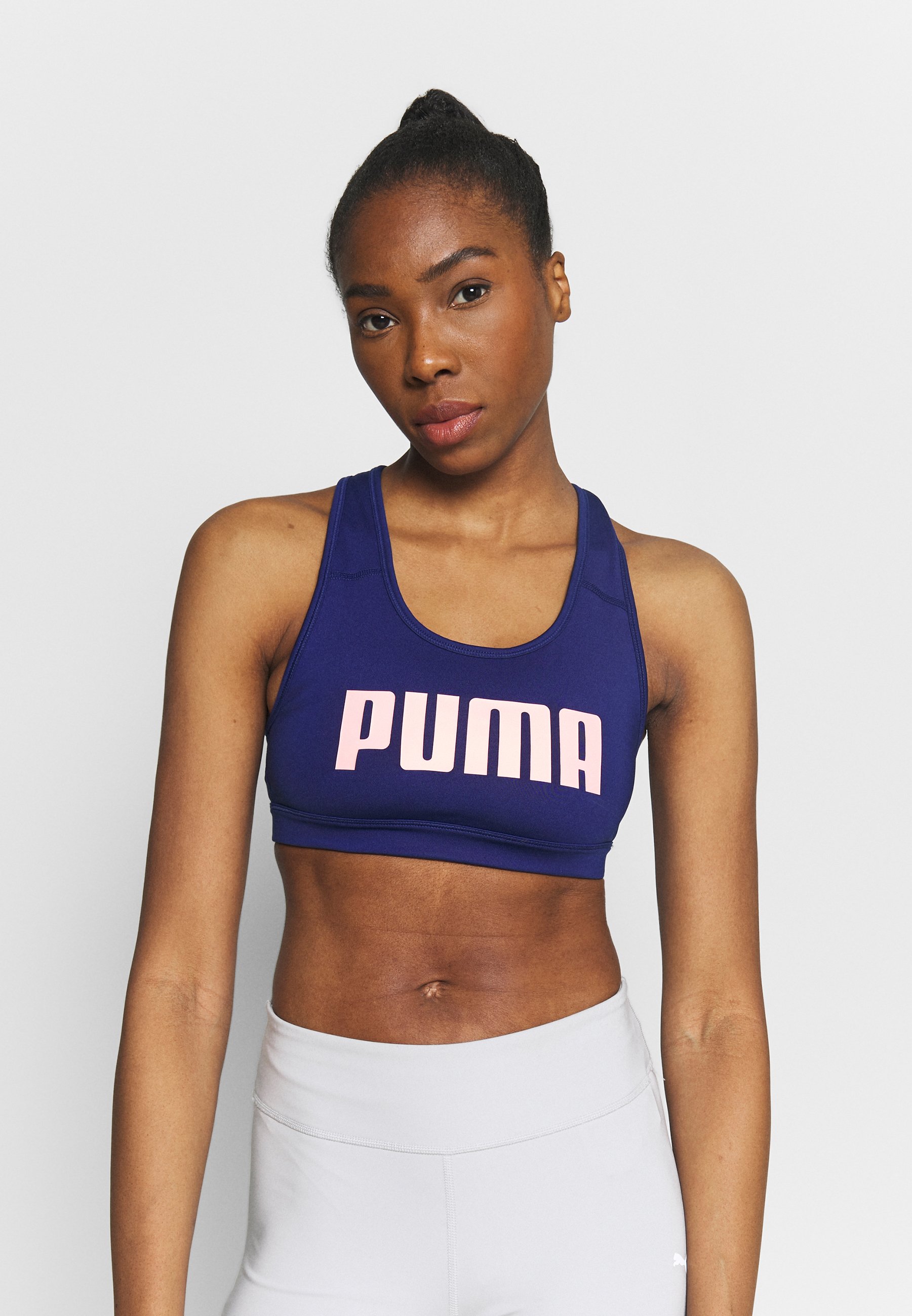 Puma MID IMPACT 4KEEPS - Sujetadores deportivos con sujeción media -  elektro blue/azul royal - Zalando.es