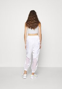 Nike Sportswear Träningsbyxor - white