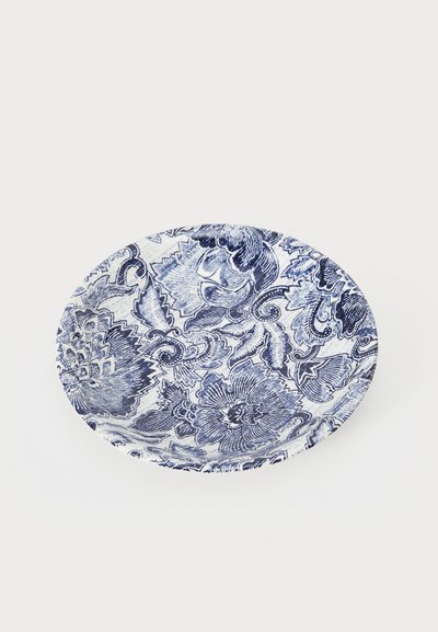 Ceramic plate with a blue floral pattern on a white background. Round shape with a smooth texture and slightly raised rim design.