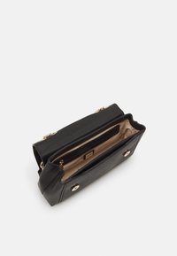 Guess LEVANTE CONVERTIBLE FLAP - Cross body bag - black