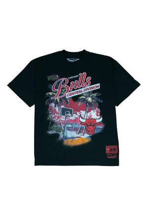 Black t-shirt with Chicago Bulls logo, basketball hoop, palm trees, and "Central Division" text on a tropical sunset background.