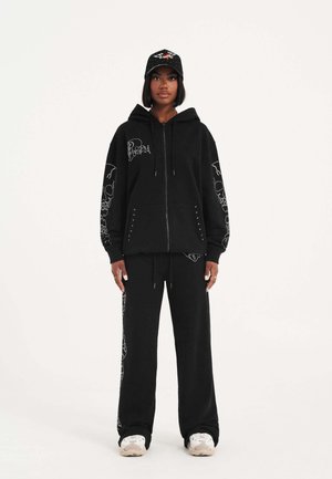CRYSTAL SKULL RELAXED JOGGERS  - Tracksuit bottoms - black