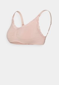 Morbido reggiseno wireless rosa con rifiniture in pizzo e spalline regolabili, progettato per il comfort e un supporto delicato.