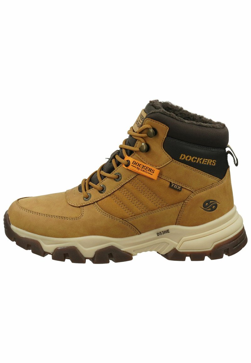 Stivale mid-top in pelle marrone con dettagli in tessuto grigio, lacci rotondi, pannelli testurizzati e suola in gomma con un motivo a battistrada profondo.