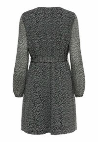 Robe noire avec manches longues en tissu transparent, taille nouée et motif floral. Le dos présente un col rond et un ourlet légèrement évasé.