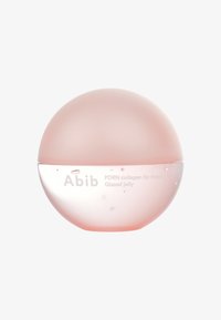 Masque à lèvres au collagène Abib PDRN dans un contenant rond semi-transparent avec un couvercle rose et un fond clair, présentant une texture lisse et brillante.
