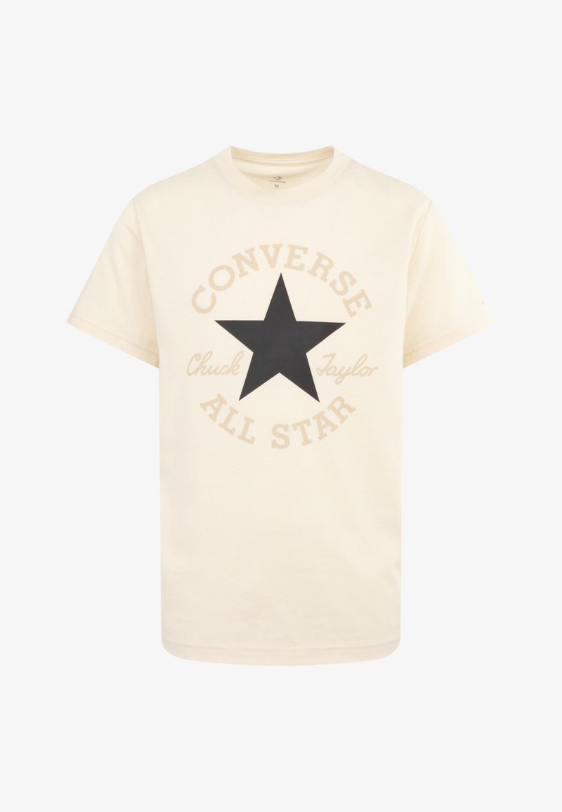 Camiseta color crema hecha de algodón con cuello redondo. Presenta una gran estrella negra y la frase "Converse All Star" impresa en beige a su alrededor.